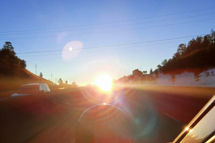 Sun glare along eastbound I-70 near Floyd Hill. 