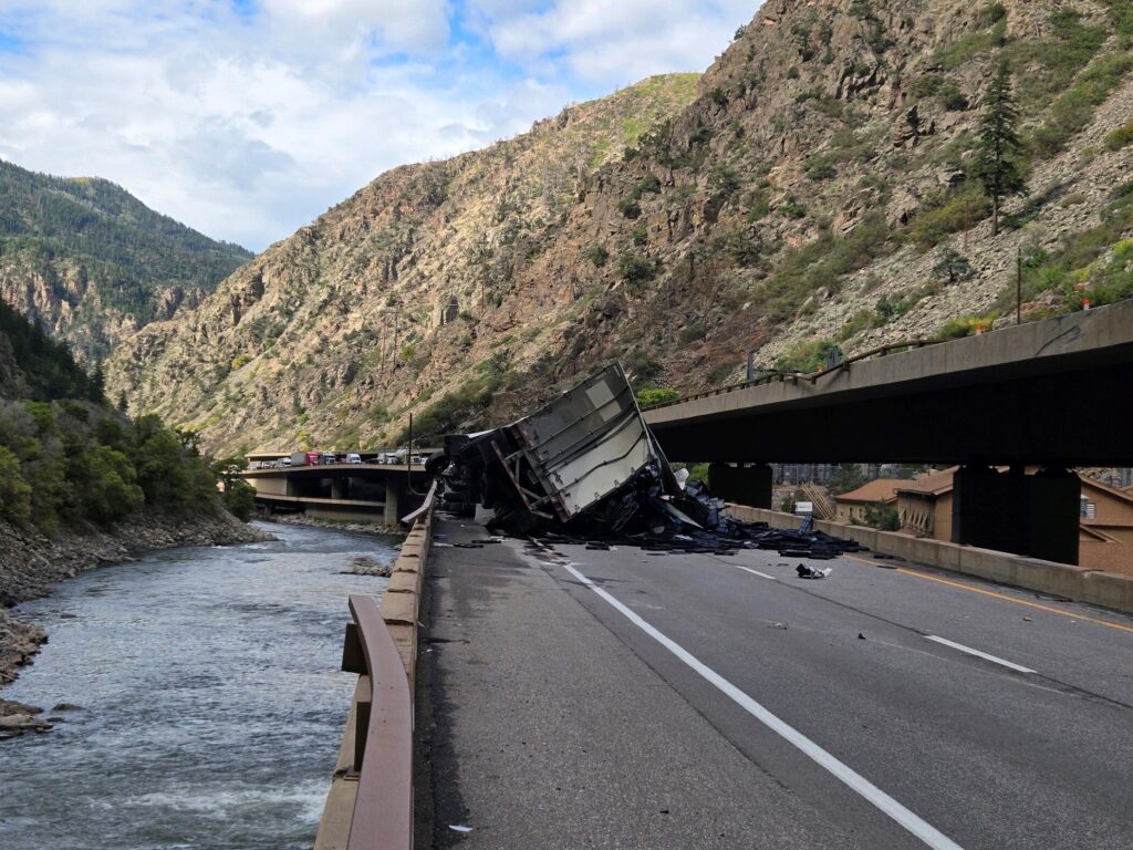 A commercial semi-truck crashed on I-70 about six miles east of Glenwood Springs at approximately 9:30 a.m. A closure remains in place for eastbound traffic. 